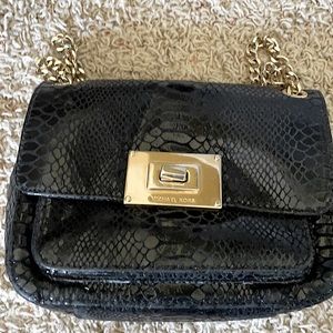 Black reptile skin gold hardware Michael Kors bag